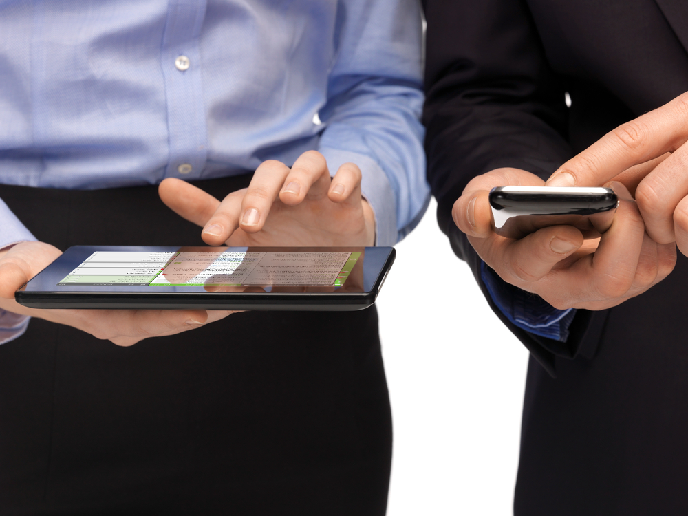iPad_-_Holding_Device_-_View_Of_Person_in_Front_Of_You_holding_Tablet-1